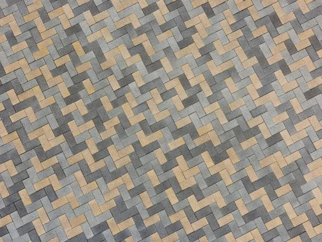 Concrete block paving laid in a herringbone bond