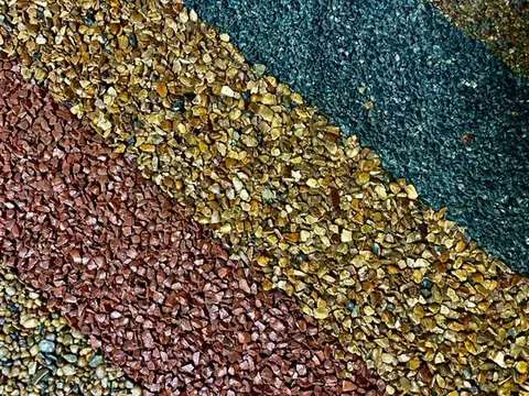 Resin bound aggregate in golden, red and charcoal blends